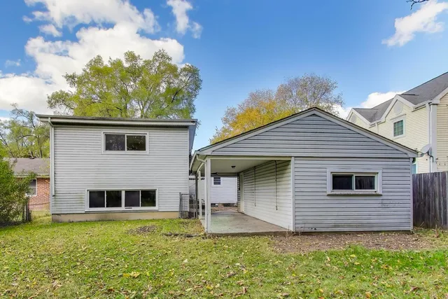 a view of a backyard with garden