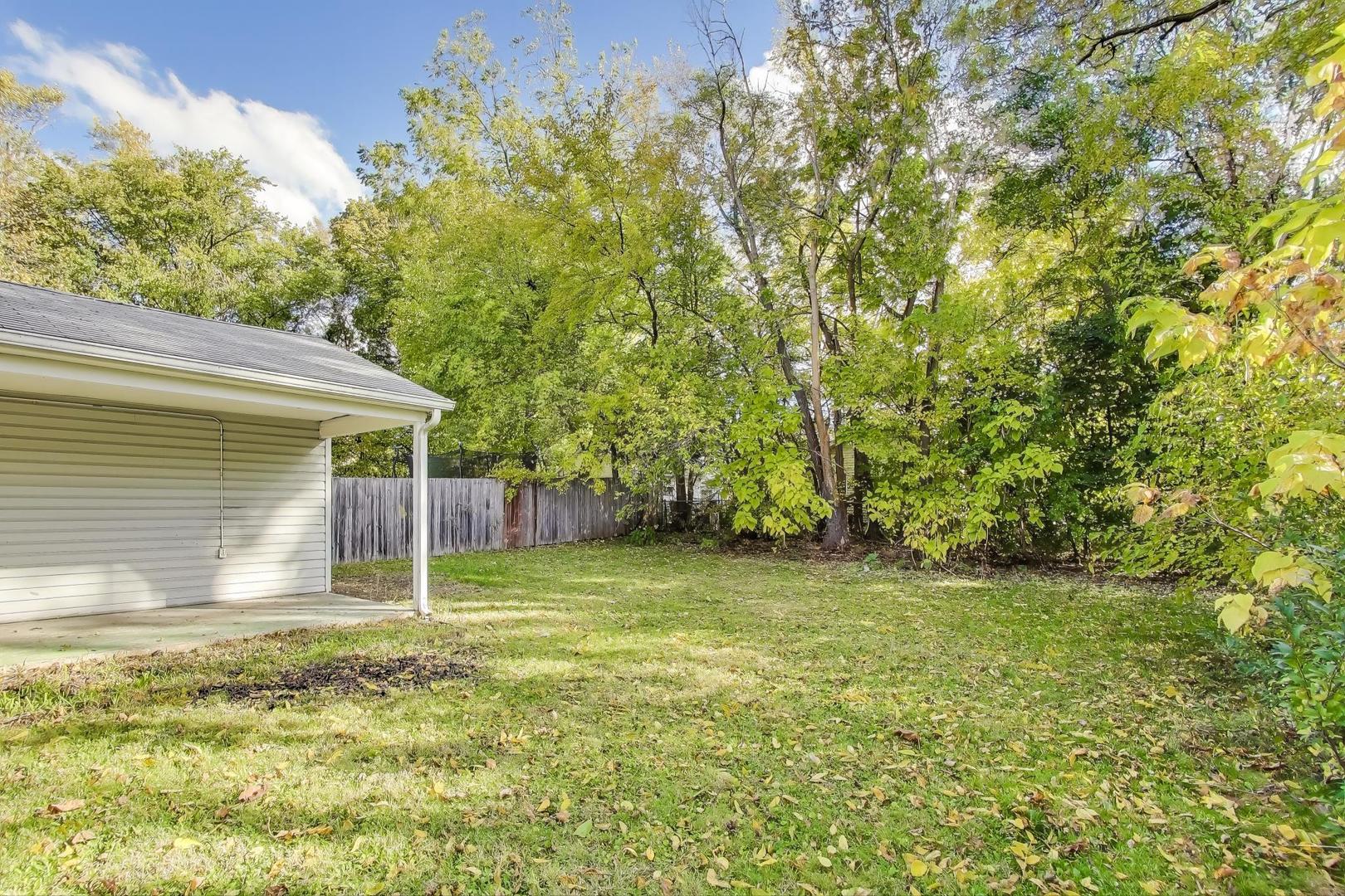221 Heine Avenue Elgin, IL 60123 - Photo 34 of 43 a backyard of a house