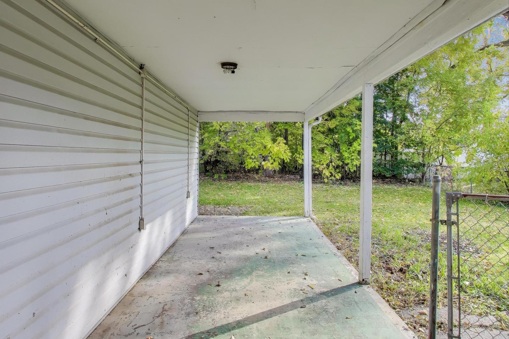 221 Heine Avenue Elgin, IL 60123 - Photo 38 of 43 a view of a backyard with garden