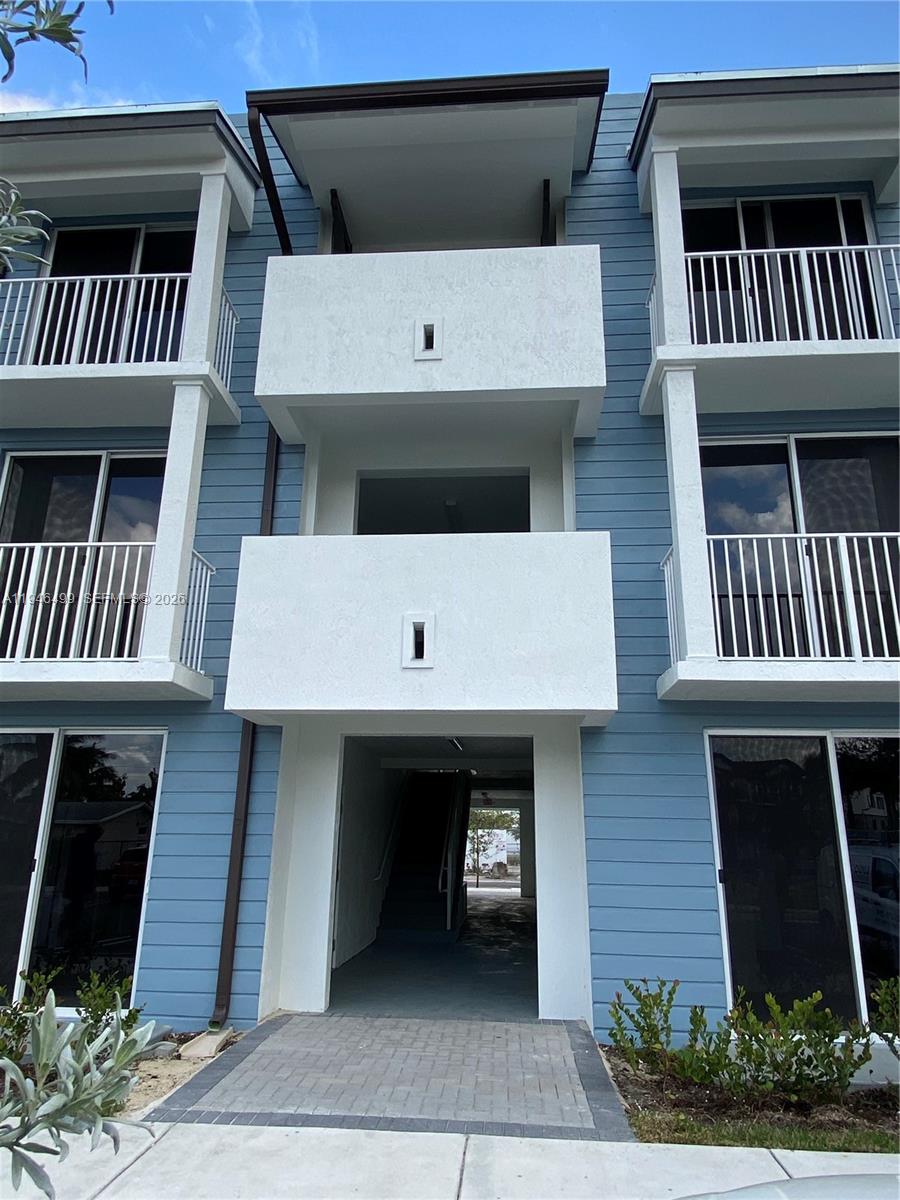 26511 Southwest 146th Court, Unit 216 Homestead, FL 33032 - Photo 2 of 6 a view of an outdoor sitting space