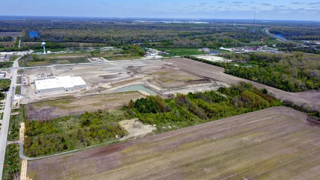 a view of a garden with a lake view