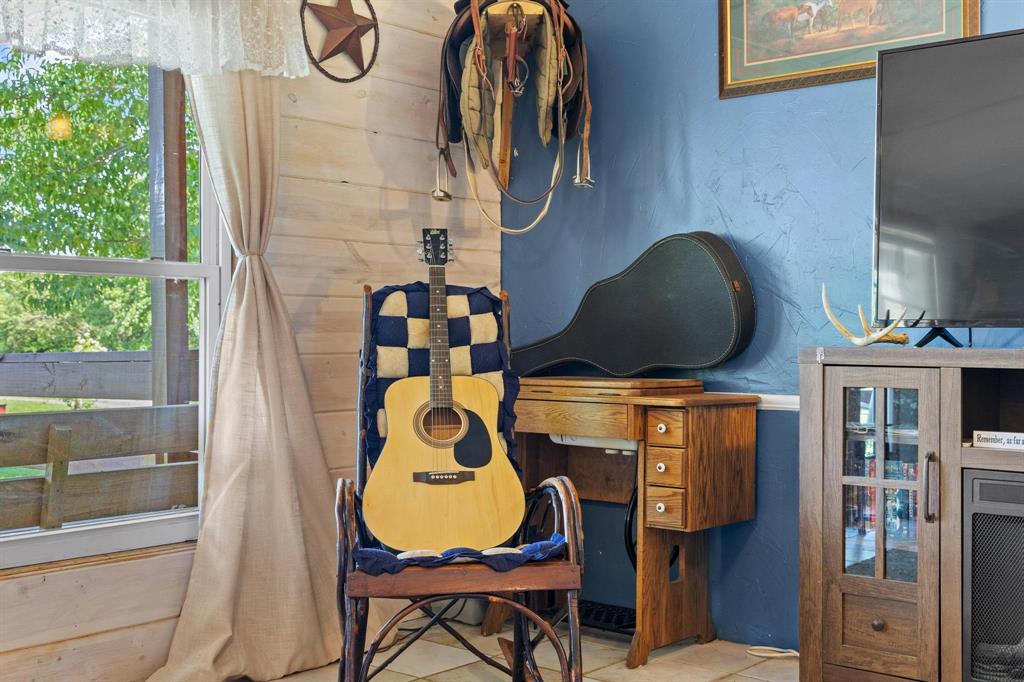 489 Delphia Drive Denison, TX 75021 - Photo 12 of 40 a stove top oven sitting next to a window