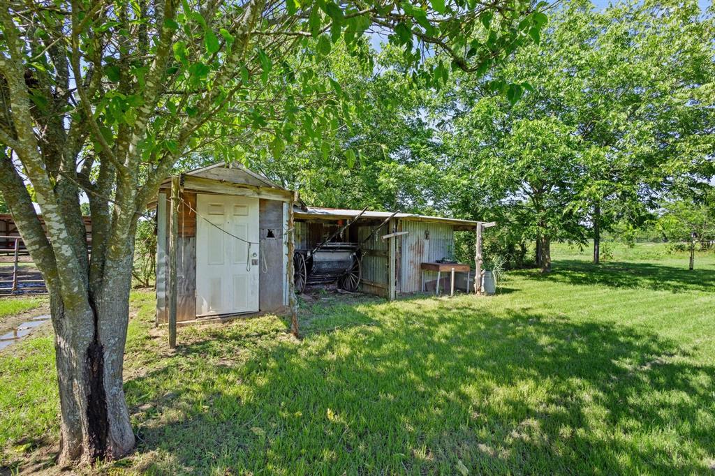 489 Delphia Drive Denison, TX 75021 - Photo 32 of 40 front view of a house with a yard