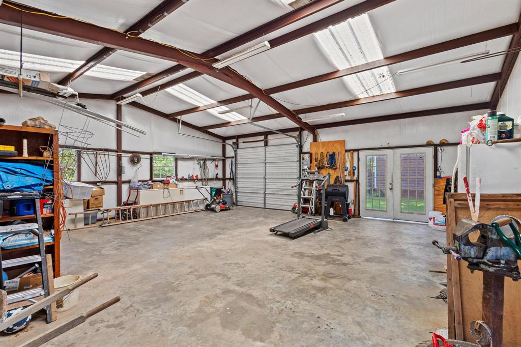 489 Delphia Drive Denison, TX 75021 - Photo 37 of 40 a view of a room with gym equipment