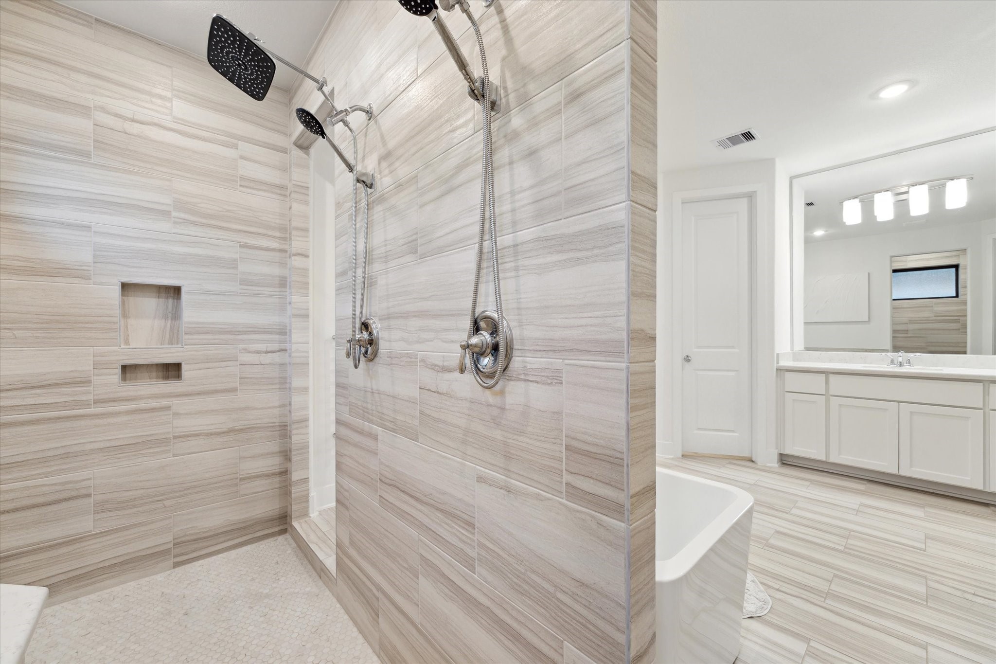 17355 Camillia Trail Conroe, TX 77302 - Photo 17 of 34 a bathroom with a shower
