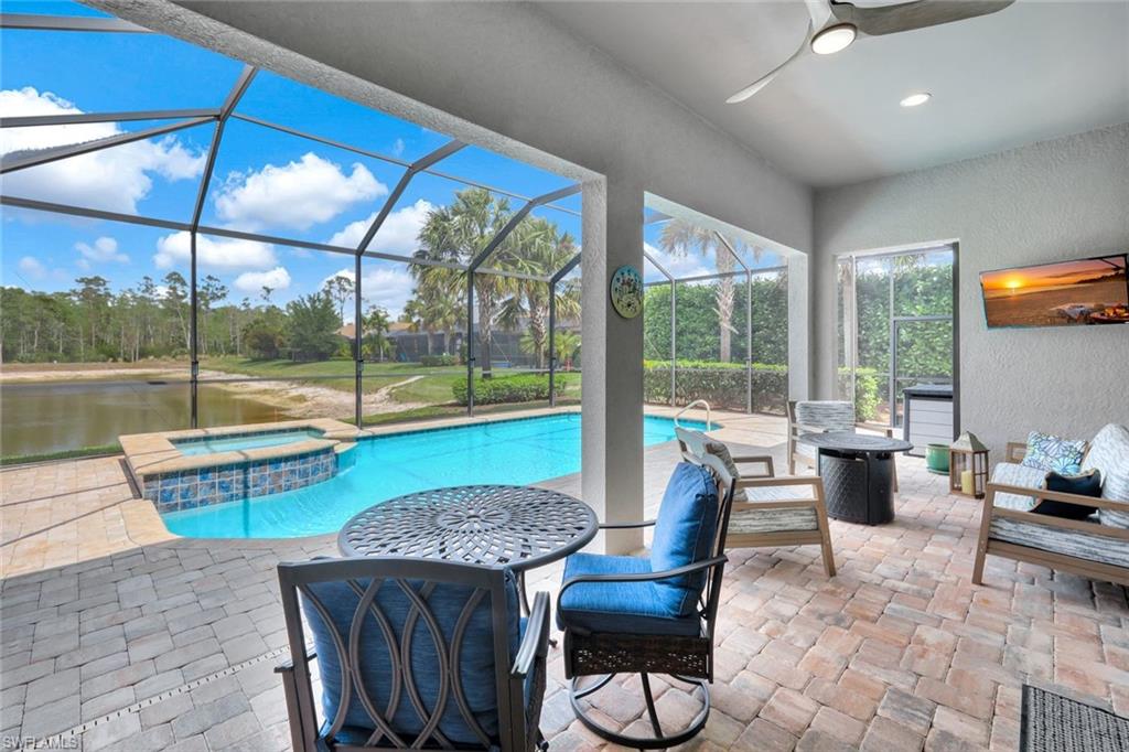 7451 Blackberry Drive Naples, FL 34114 - Photo 28 of 30 a view of a dining room with furniture window and outside view