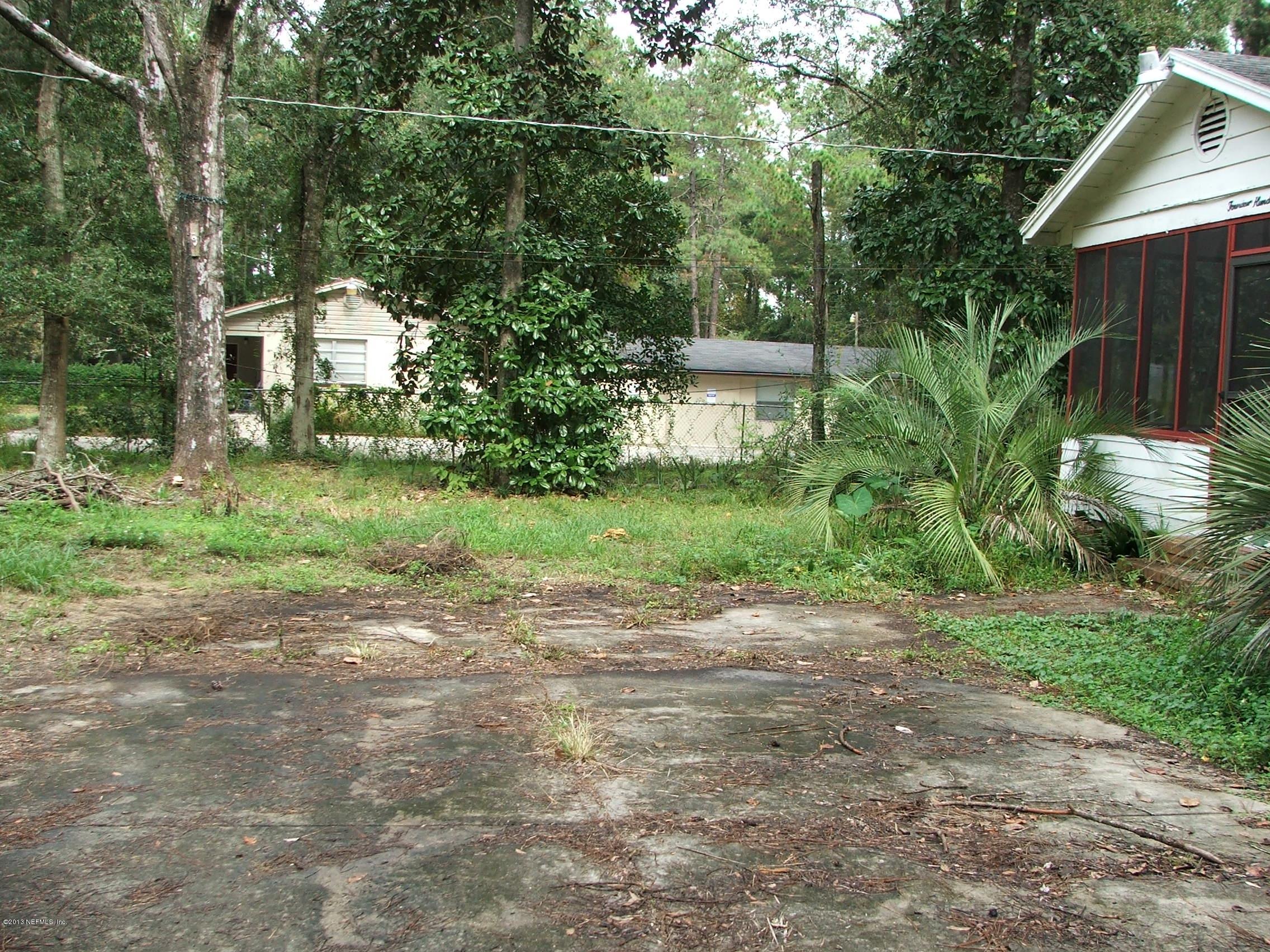 1451 Parental Home Road Jacksonville, FL 32216 - Photo 23 of 25 wide front yard from driveway