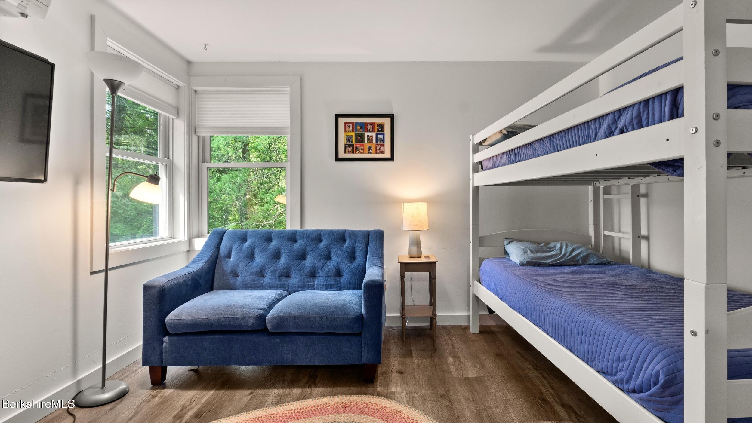 418 Monterey Road Great Barrington, MA 01230 - Photo 20 of 28 a bedroom with a bed couch and window