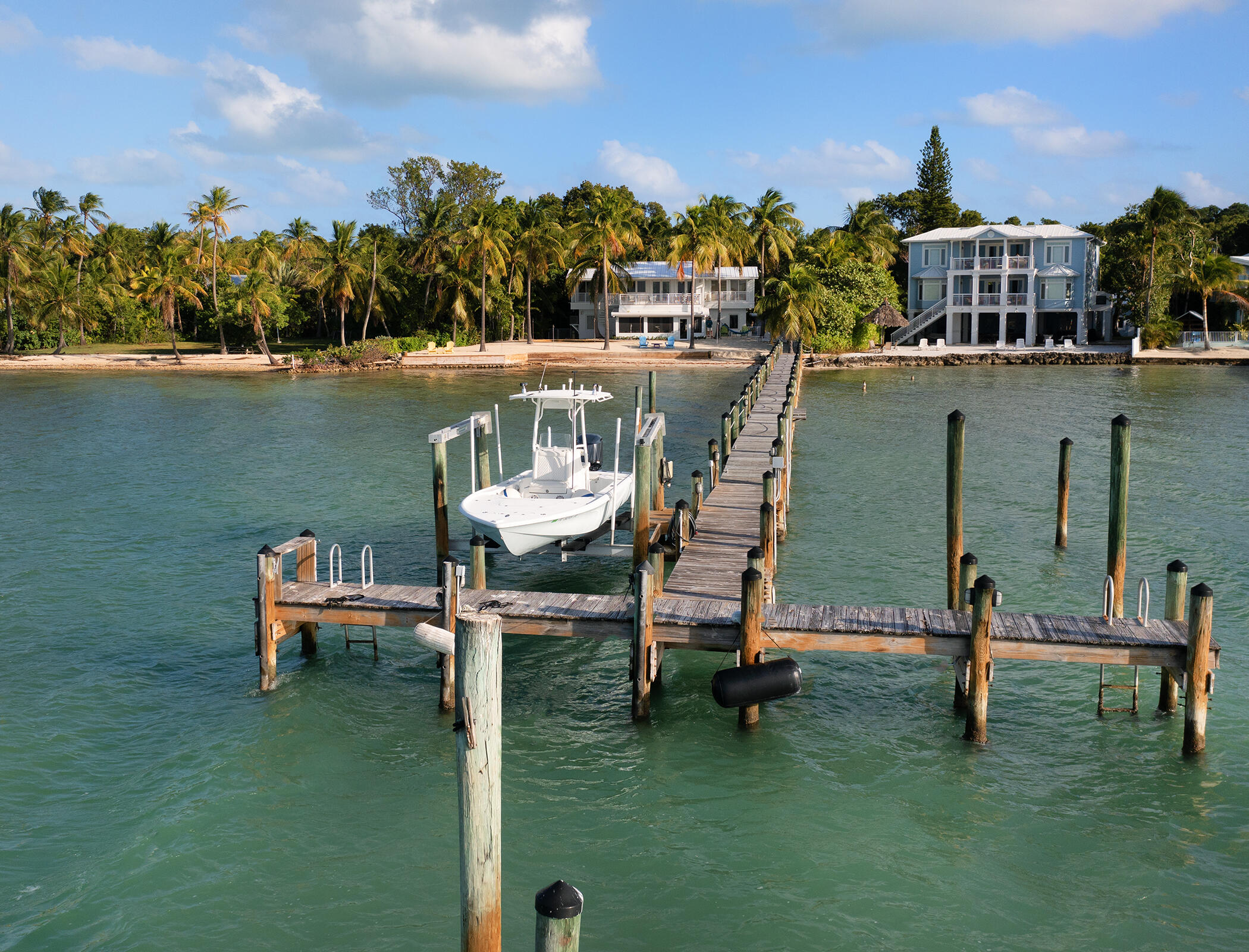 58 Sunset Road Key Largo, FL 33037 - Photo 3 of 25 Dock with lift