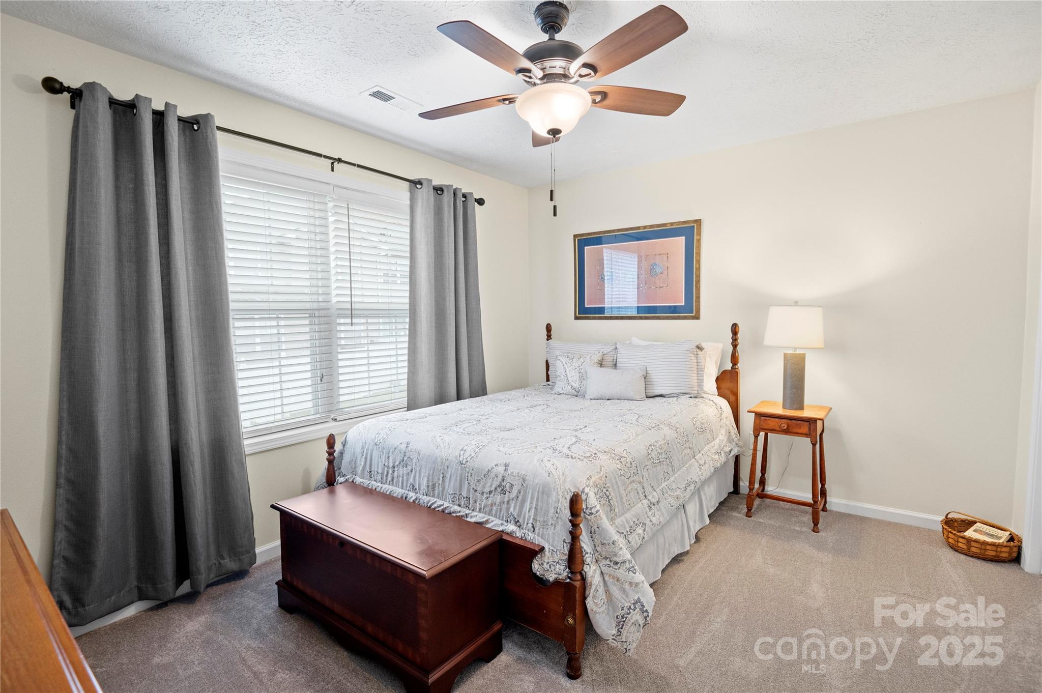 204 Pembrook Road Swannanoa, NC 28778 - Photo 11 of 15 a bedroom with a bed dresser and a window