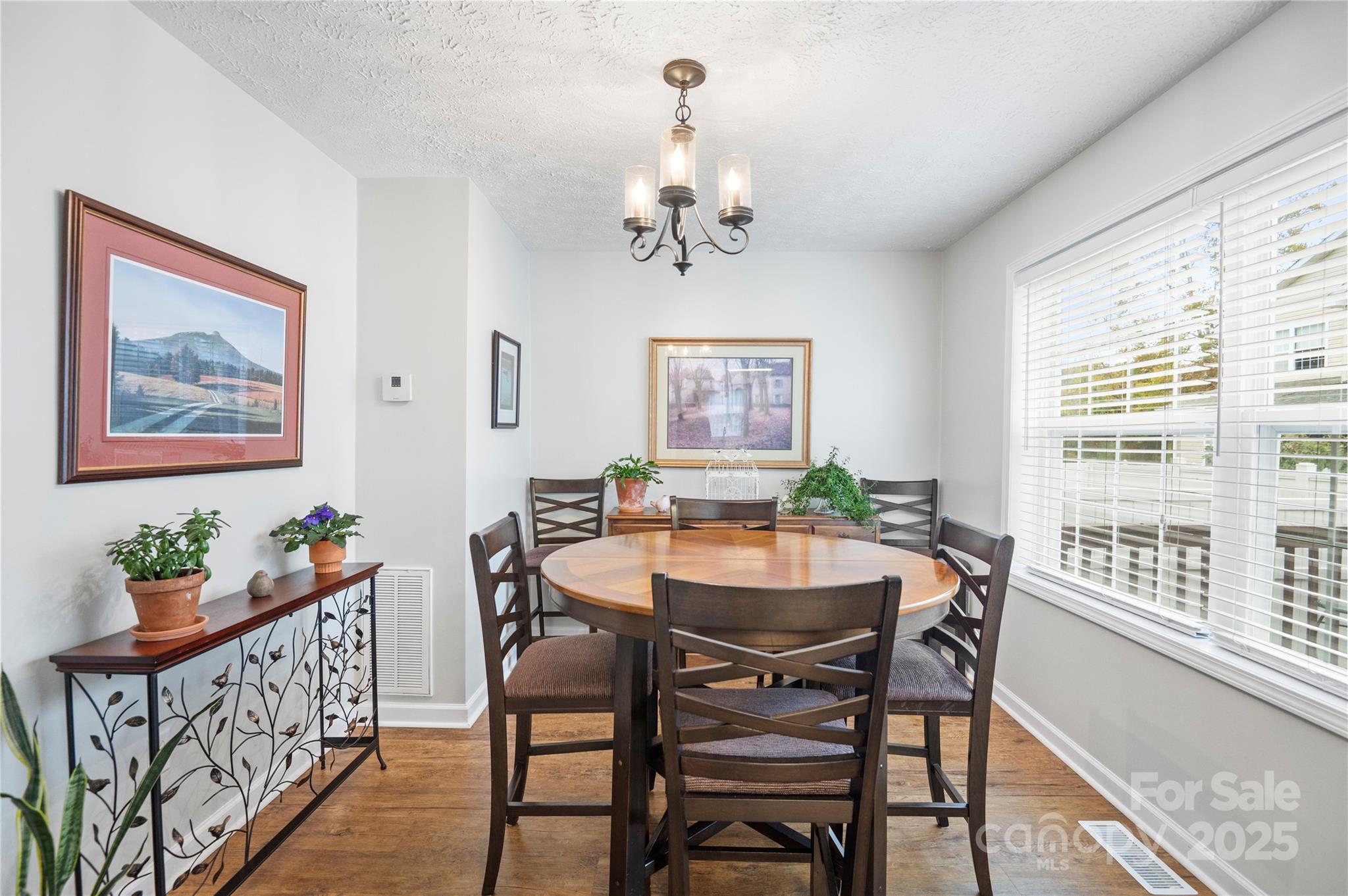 204 Pembrook Road Swannanoa, NC 28778 - Photo 4 of 15 a view of a dining room with furniture window and wooden floor