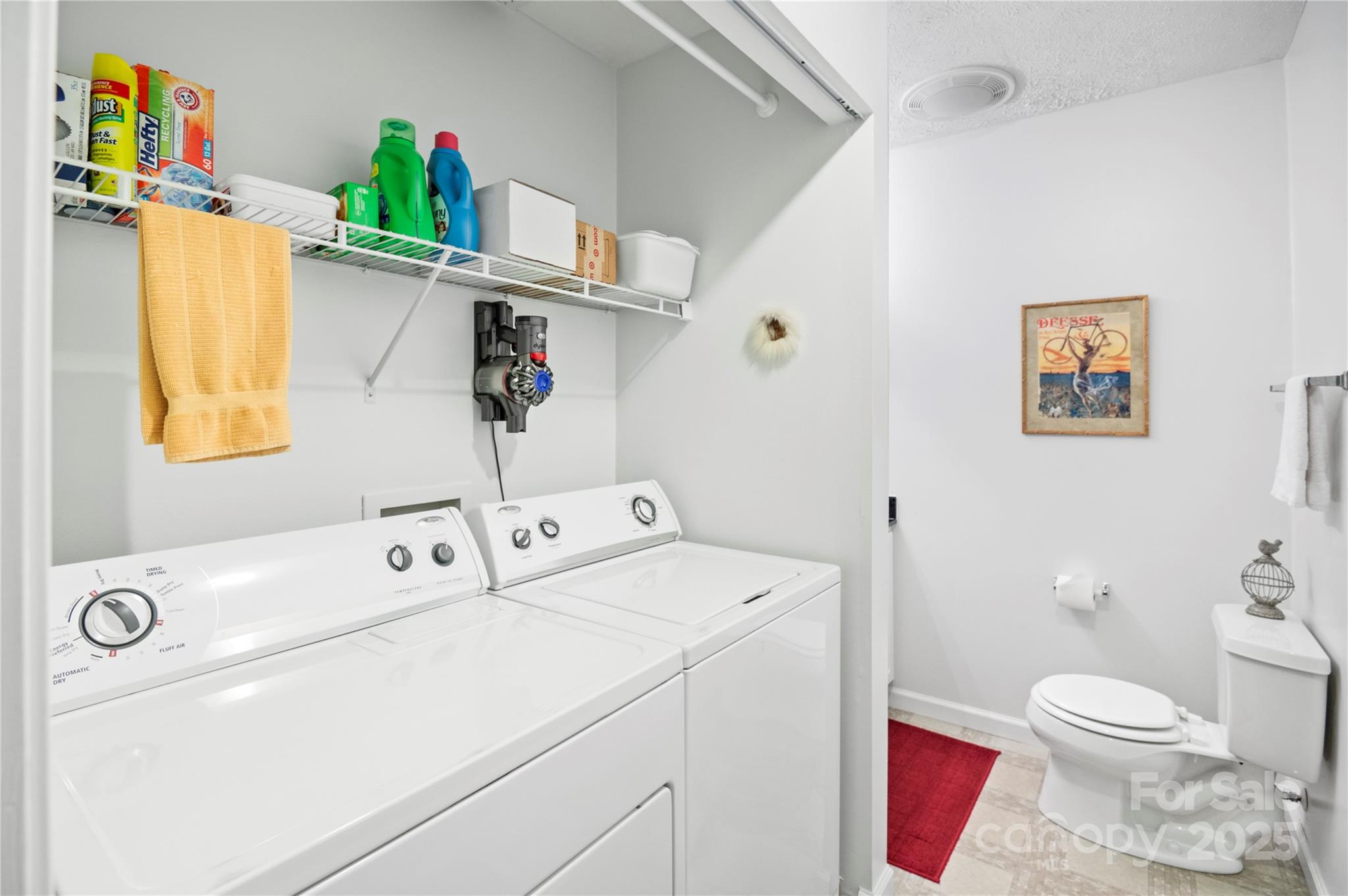204 Pembrook Road Swannanoa, NC 28778 - Photo 6 of 15 a bathroom with a sink a toilet and a shower curtain