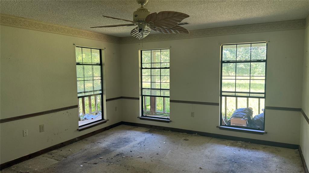 6582 Taylor Road Kaufman, TX 75142 - Photo 26 of 40 an empty room with windows