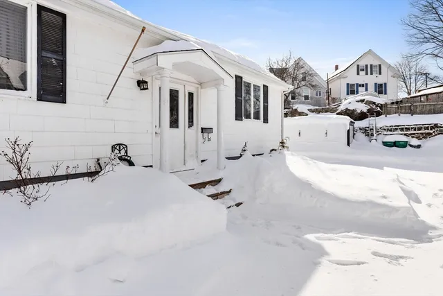 a view of living room with furniture and cabinets