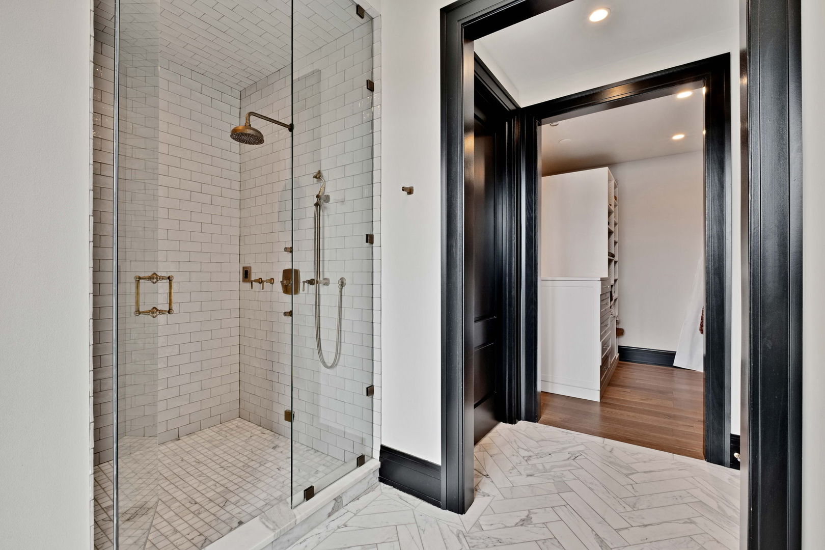 1109 West Washington Boulevard, Unit 5C Chicago, IL 60607 - Photo 27 of 31 a bathroom with a shower and a mirror