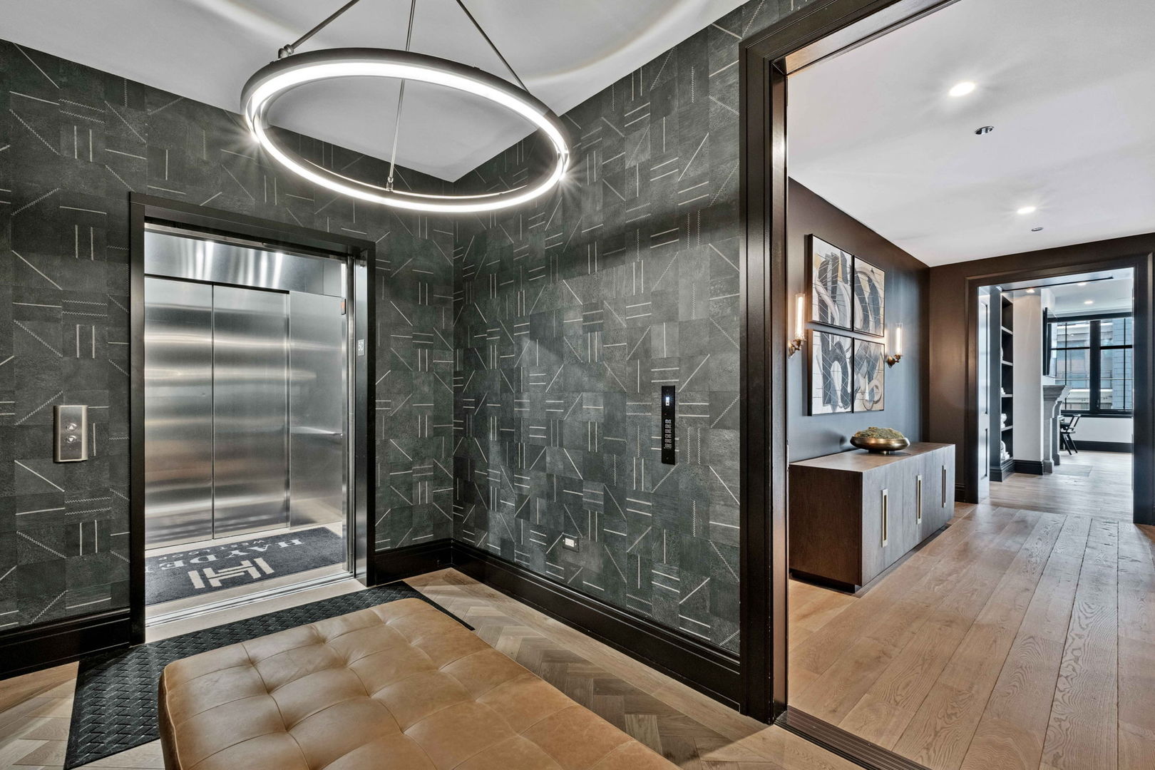 1109 West Washington Boulevard, Unit 5C Chicago, IL 60607 - Photo 4 of 31 a spacious bathroom with a mirror a bathtub and a shower