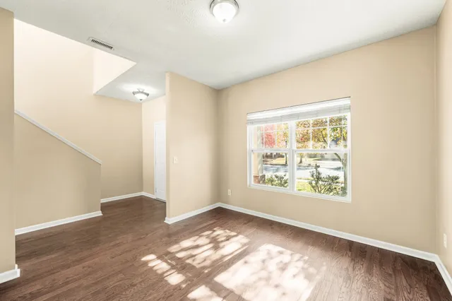 a bathroom with a sink a mirror and a light fixture