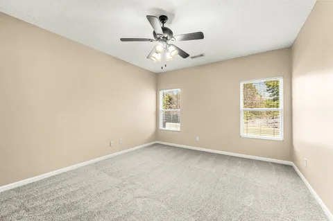 a bathroom with a sink double vanity and a mirror