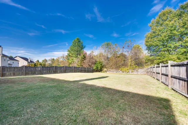 a view of a house with a swimming pool