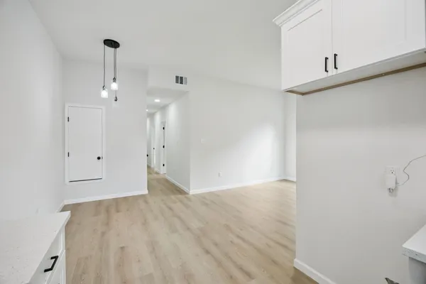 a view of an empty room and window