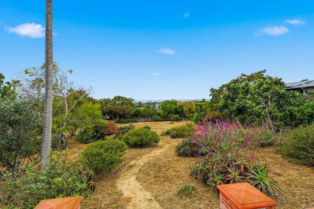 1042 Hymettus Avenue Encinitas, CA 92024 - Photo 39 of 51 a view of a lake with a house in the background