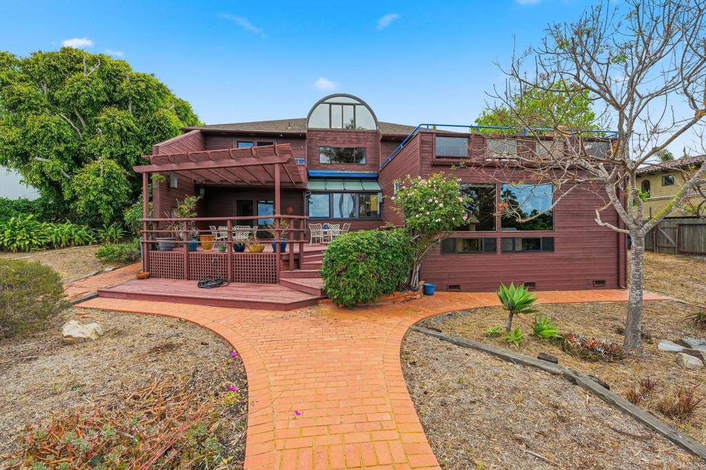 1042 Hymettus Avenue Encinitas, CA 92024 - Photo 40 of 51 a front view of a house with garden