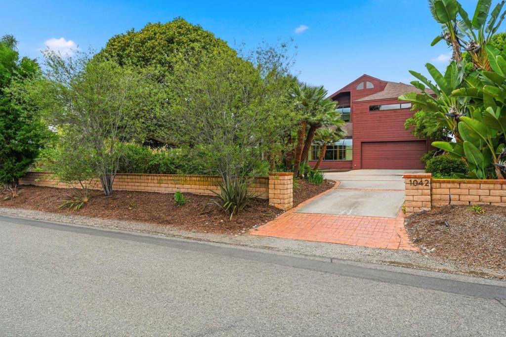 1042 Hymettus Avenue Encinitas, CA 92024 - Photo 41 of 51 an aerial view of a house with a yard and a large parking space