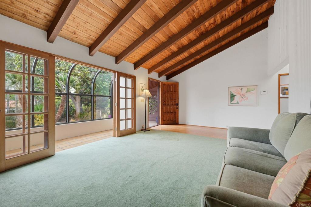 1042 Hymettus Avenue Encinitas, CA 92024 - Photo 10 of 51 a living room with furniture with a large window
