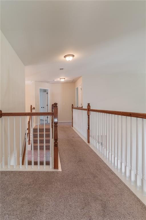 206 Sawtooth Court Canton, GA 30114 - Photo 16 of 43 a view of staircase with wooden floor