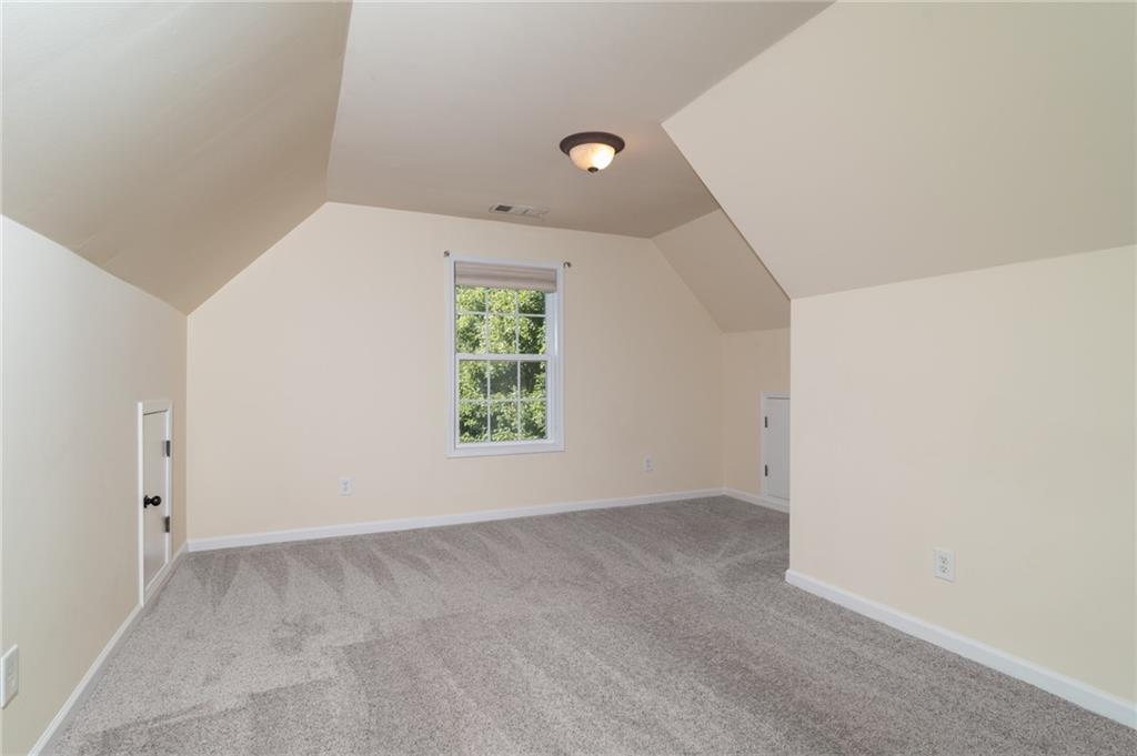 206 Sawtooth Court Canton, GA 30114 - Photo 18 of 43 an empty room with windows