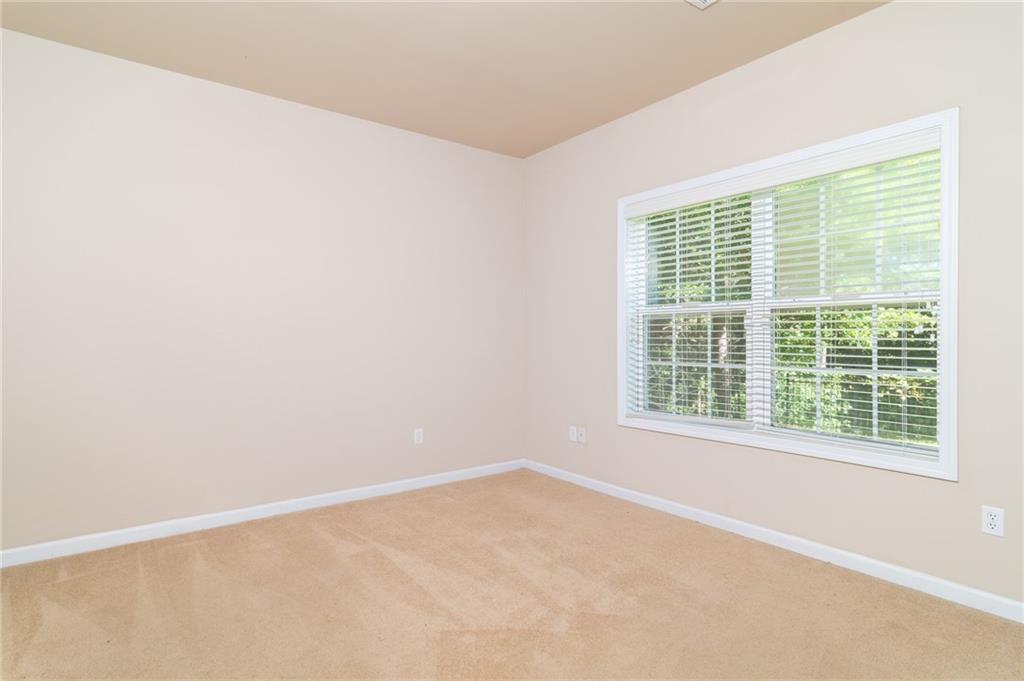 206 Sawtooth Court Canton, GA 30114 - Photo 24 of 43 a view of an empty room with a window