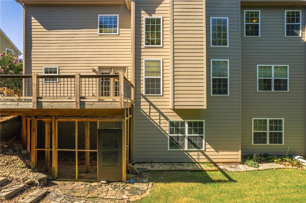 206 Sawtooth Court Canton, GA 30114 - Photo 35 of 43 a front view of a house with a yard