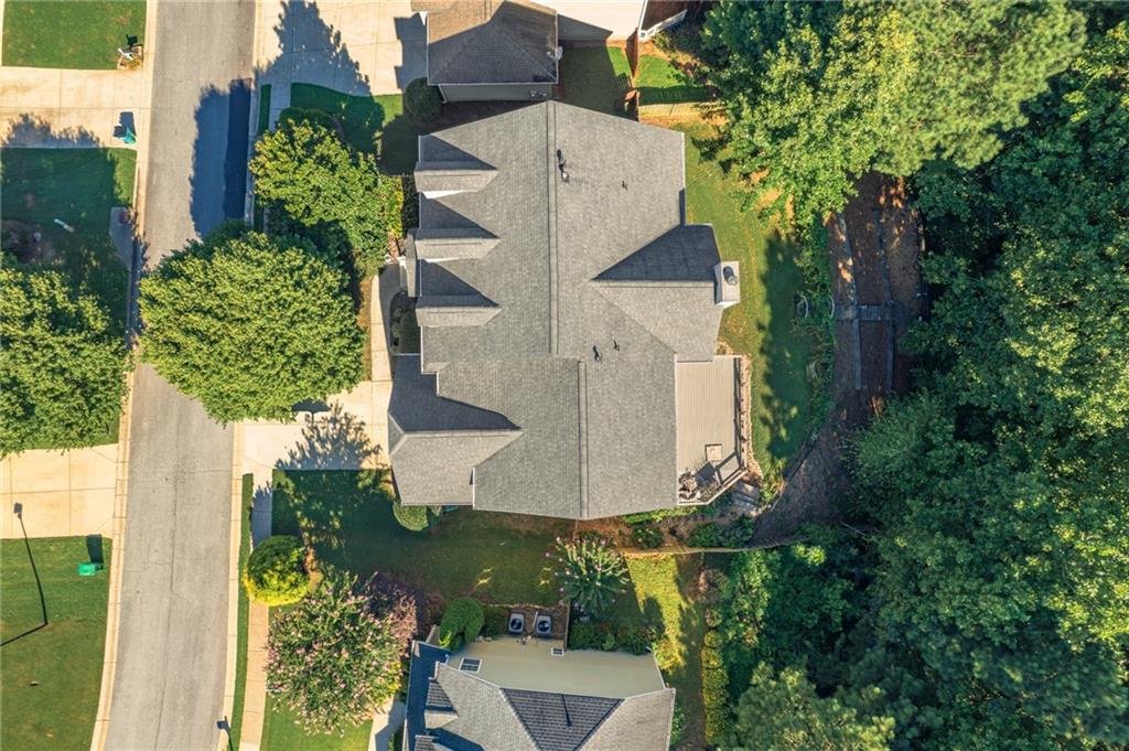 206 Sawtooth Court Canton, GA 30114 - Photo 41 of 43 an aerial view of a house with a yard and garden
