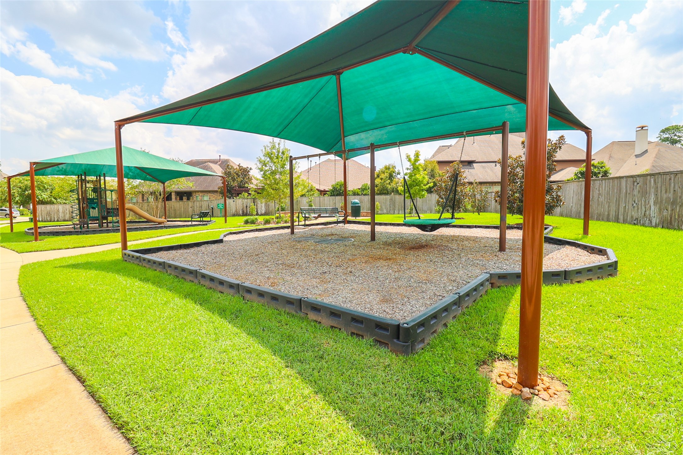 2406 Barclay Lake Lane Spring, TX 77388 - Photo 1 of 50 a view of a patio with a table chairs and a patio