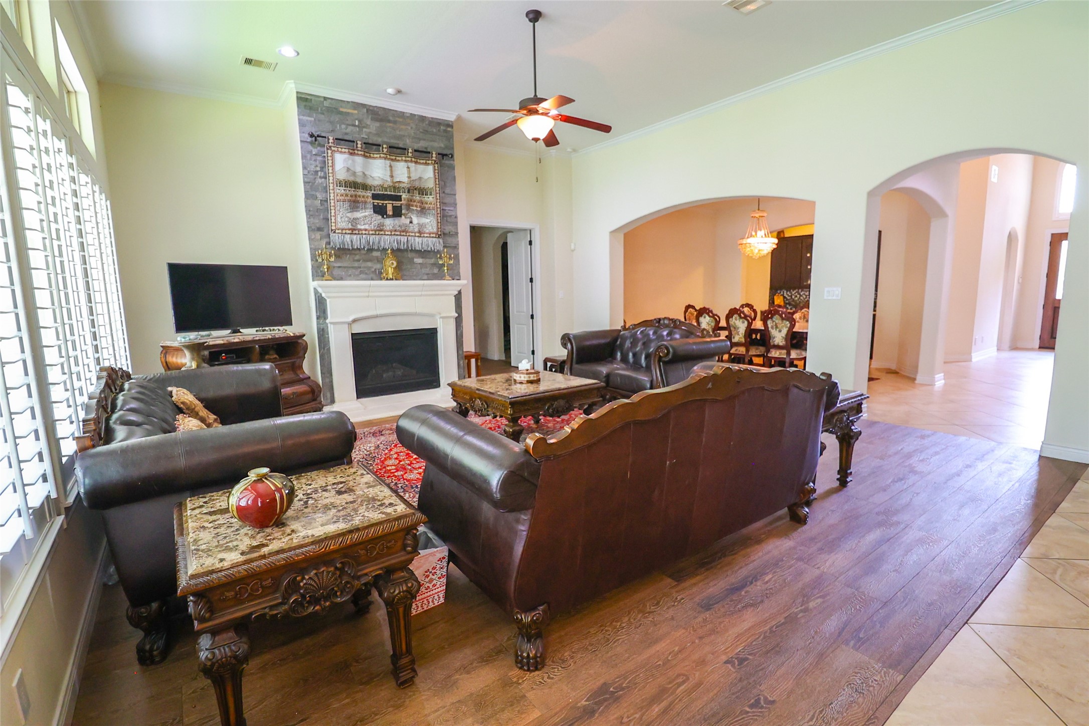 2406 Barclay Lake Lane Spring, TX 77388 - Photo 13 of 50 a living room with furniture fireplace and flat screen tv