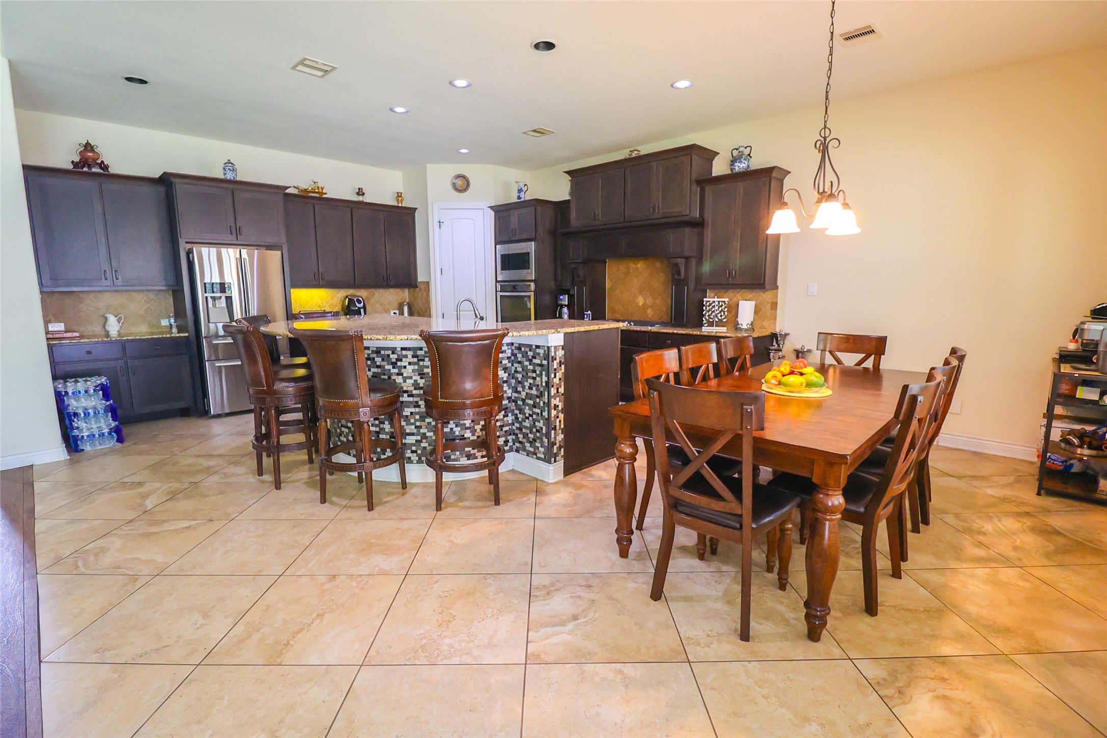 2406 Barclay Lake Lane Spring, TX 77388 - Photo 14 of 50 a view of a dining room with furniture