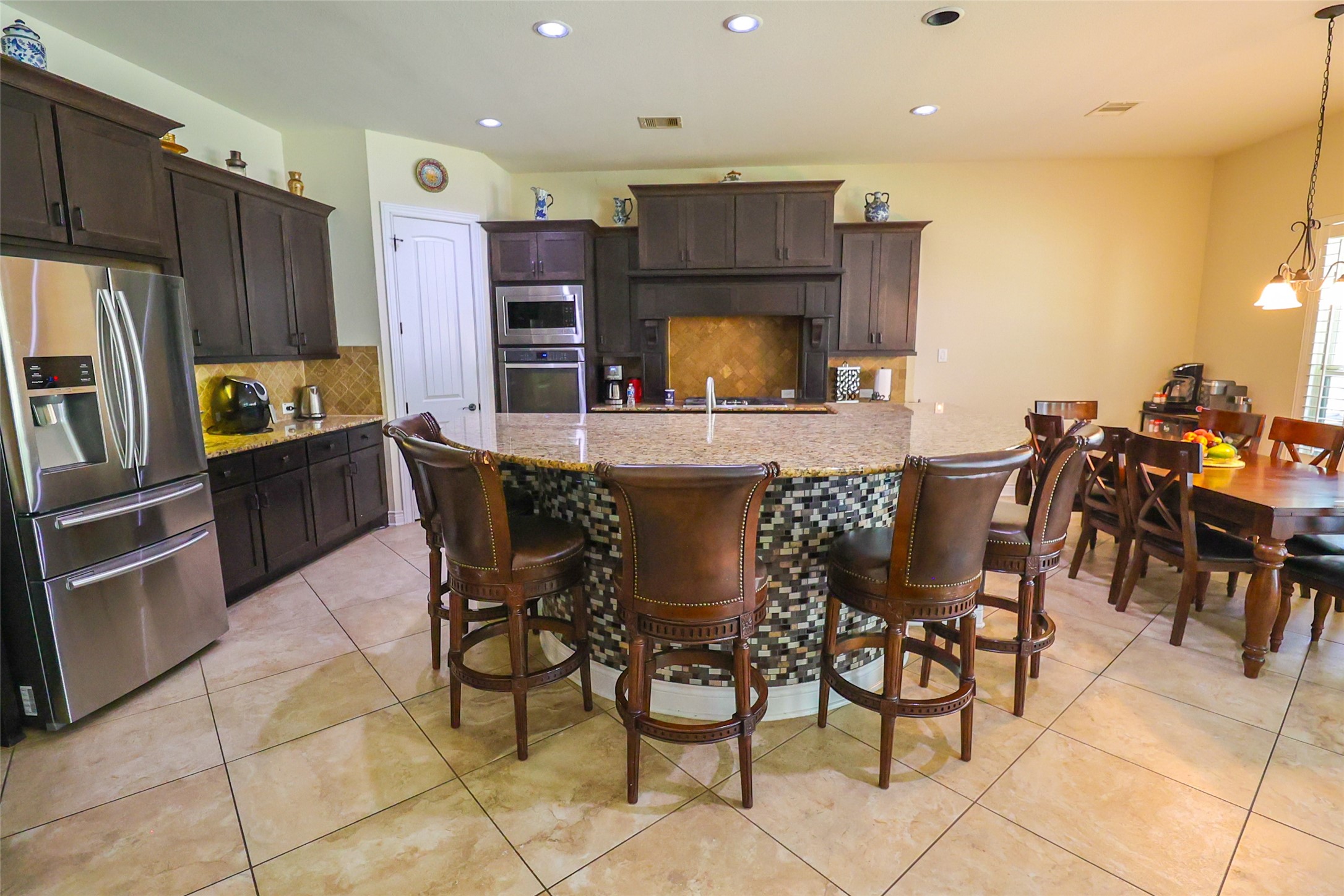 2406 Barclay Lake Lane Spring, TX 77388 - Photo 17 of 50 a view of a dining room with furniture