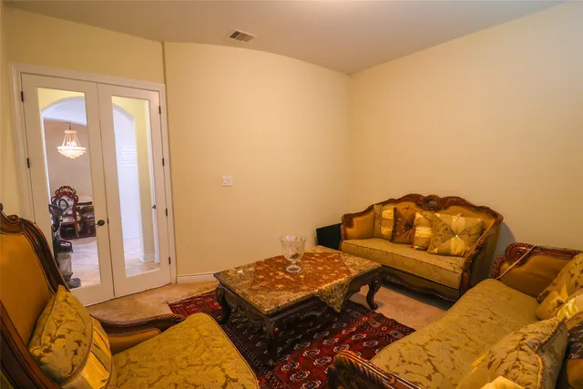 a bedroom with a bed and couch