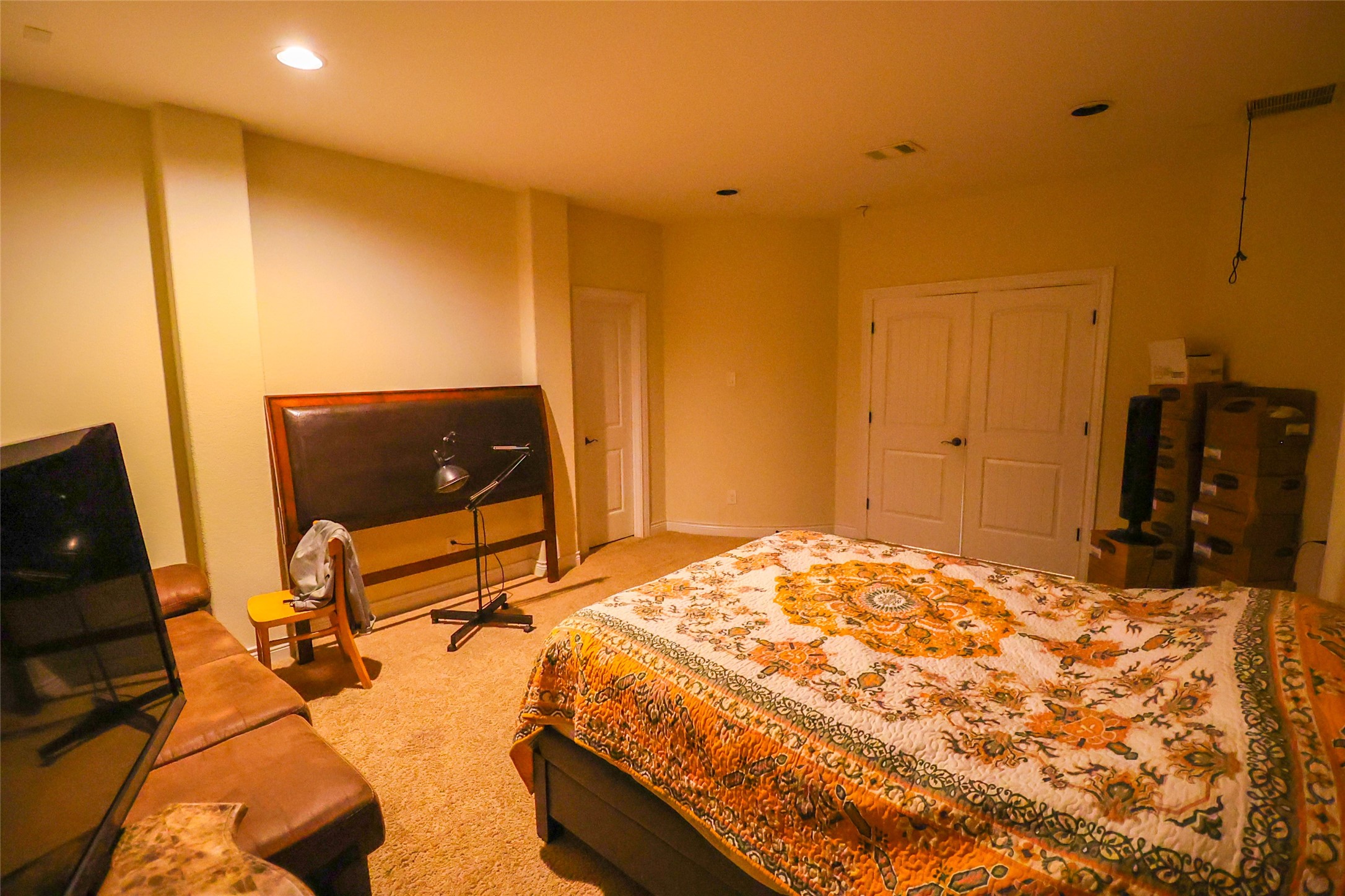 2406 Barclay Lake Lane Spring, TX 77388 - Photo 24 of 50 a bedroom with a bed and wooden floor