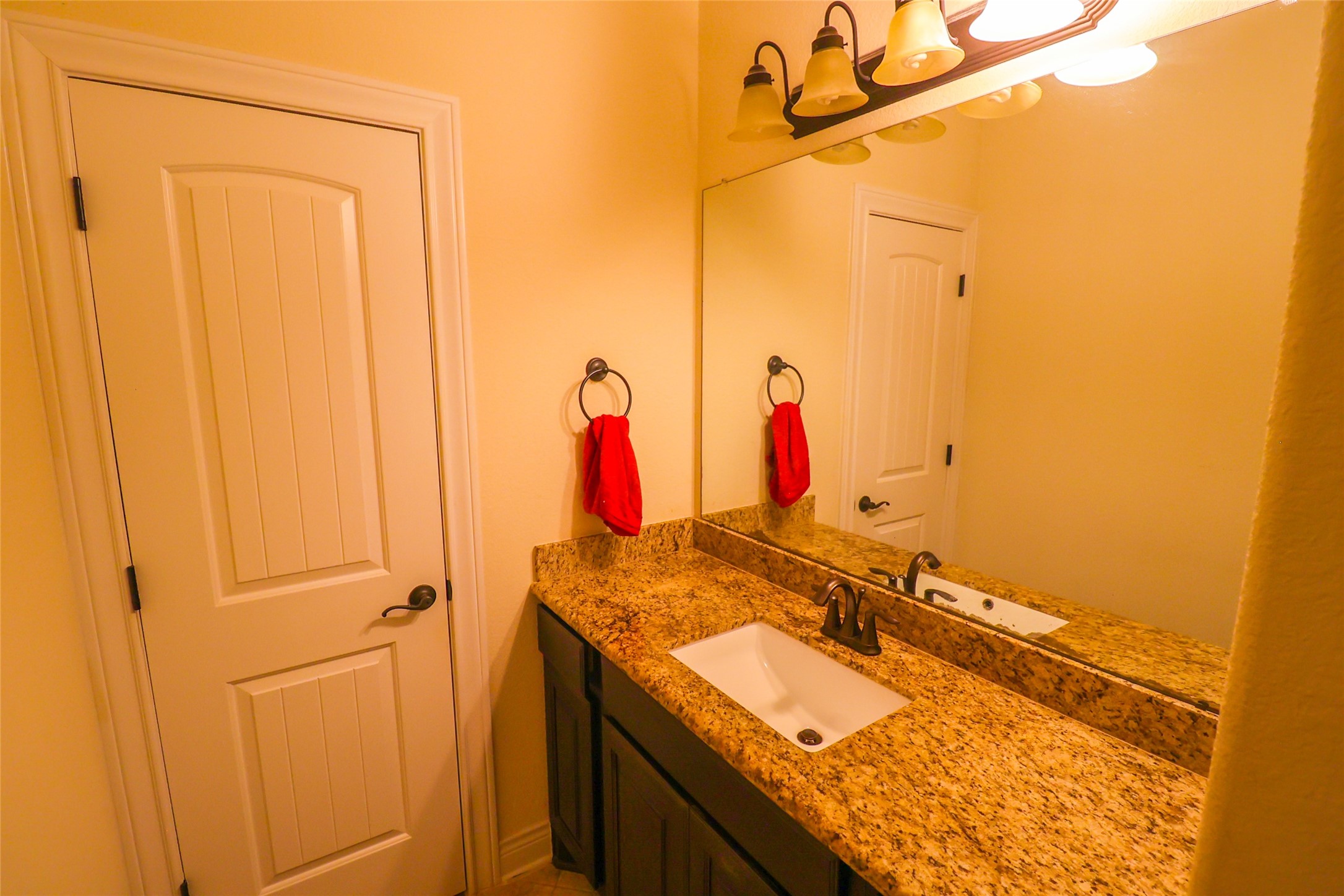 2406 Barclay Lake Lane Spring, TX 77388 - Photo 27 of 50 a bathroom with a sink and a mirror
