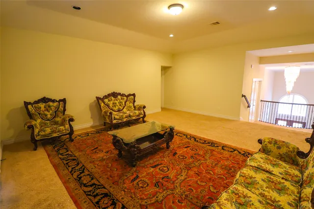 a view of a patio with table and chairs and potted plants