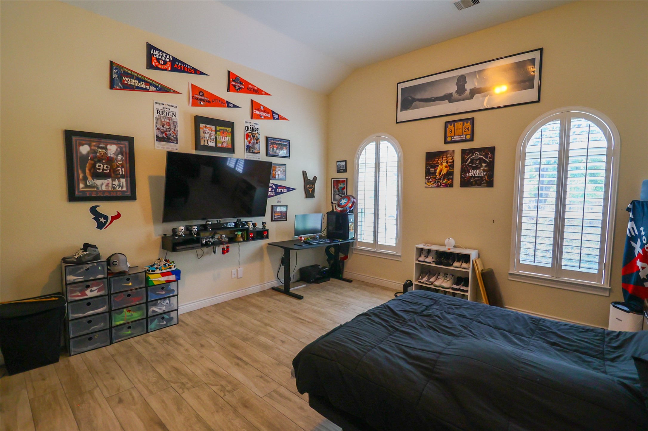 2406 Barclay Lake Lane Spring, TX 77388 - Photo 33 of 50 a bedroom with a bed and a flat screen tv