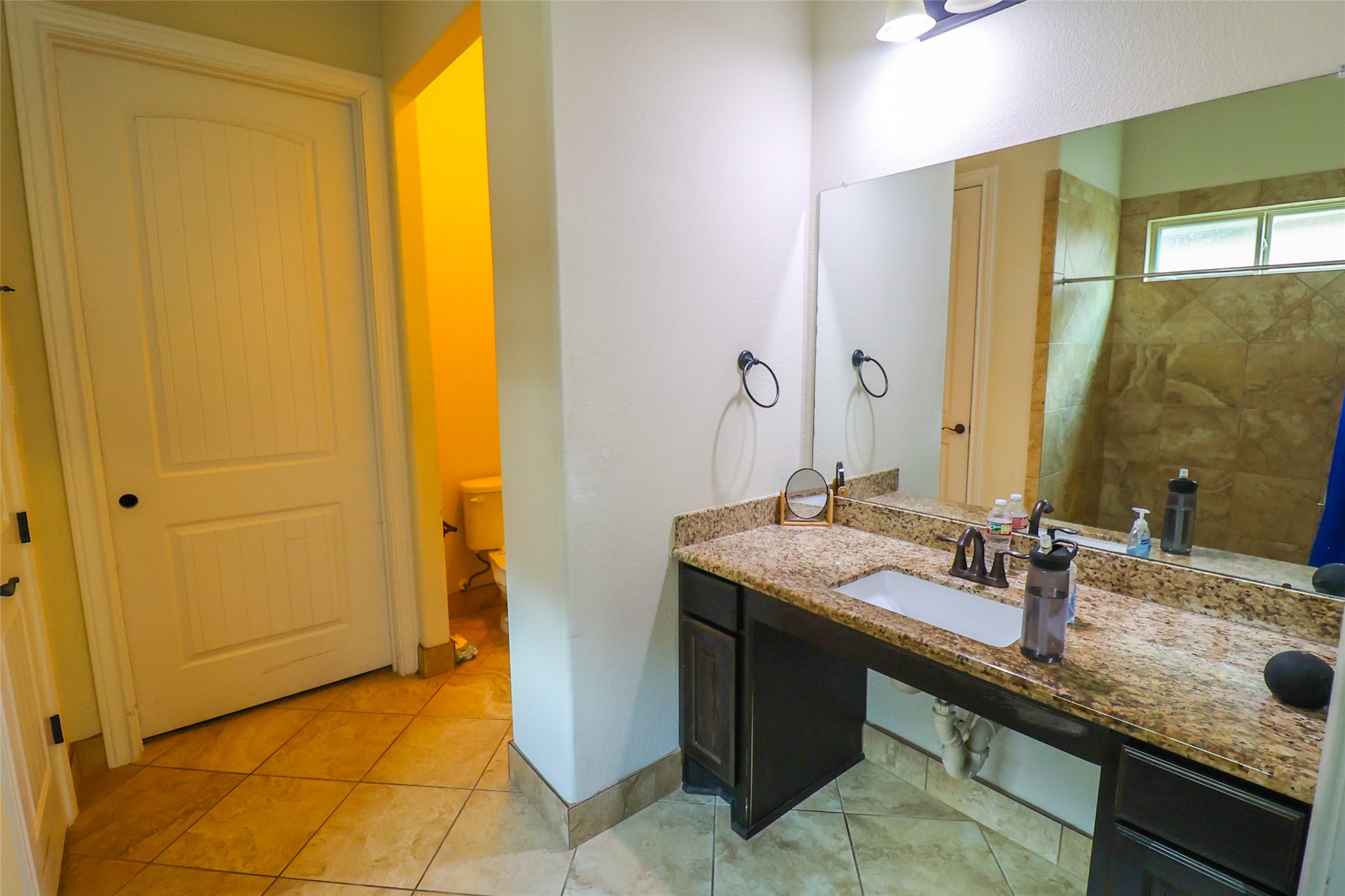 2406 Barclay Lake Lane Spring, TX 77388 - Photo 36 of 50 a bathroom with a granite countertop sink and a mirror