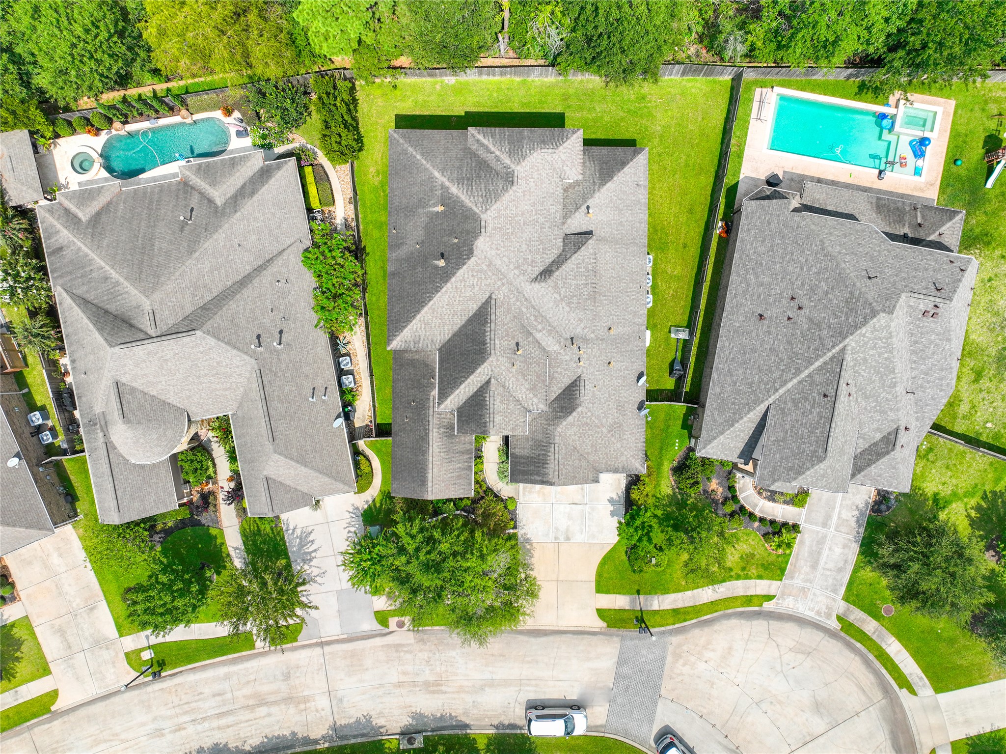 2406 Barclay Lake Lane Spring, TX 77388 - Photo 47 of 50 an aerial view of a house with a garden