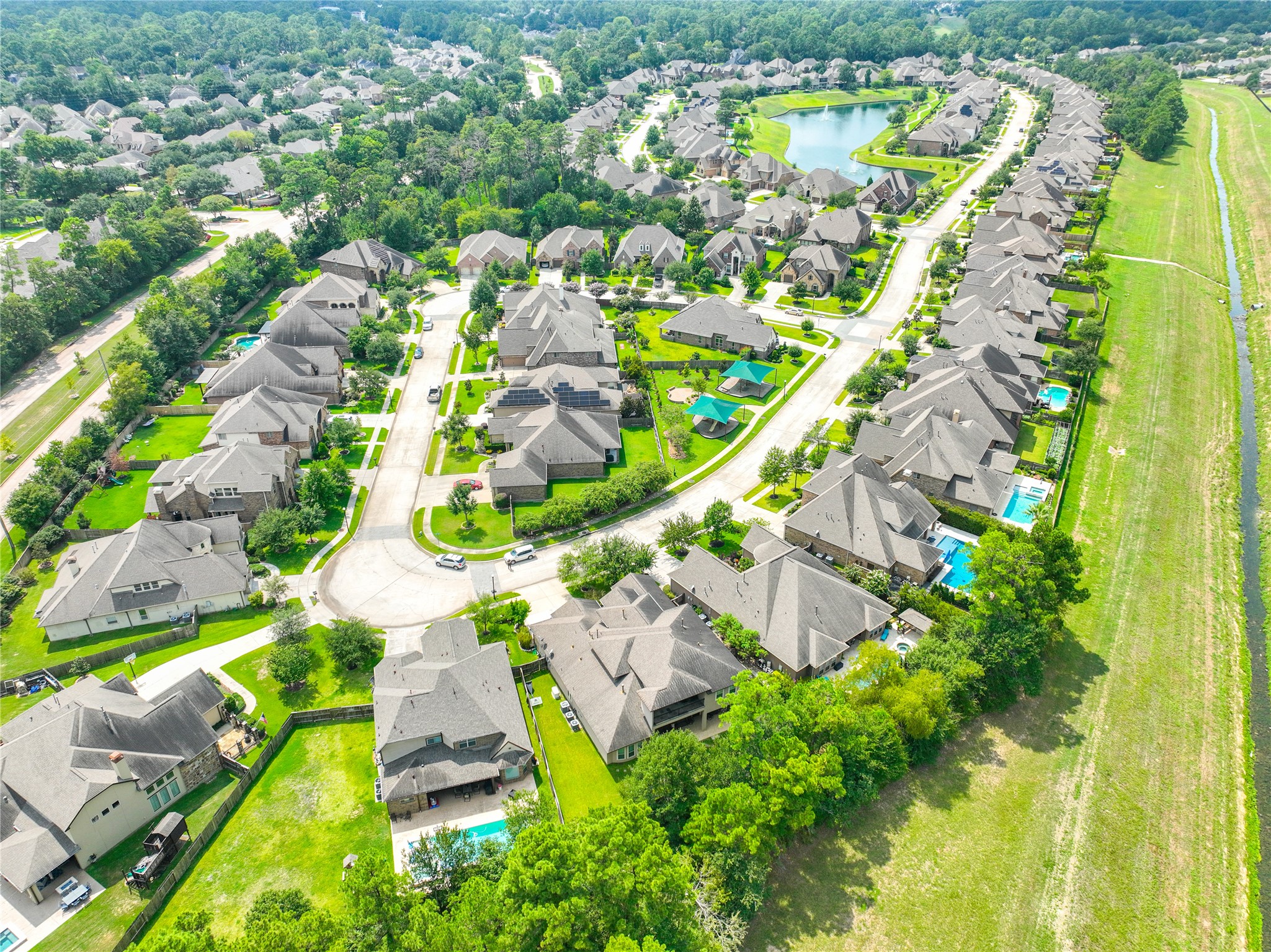 2406 Barclay Lake Lane Spring, TX 77388 - Photo 48 of 50 an aerial view of residential houses with outdoor space and street view