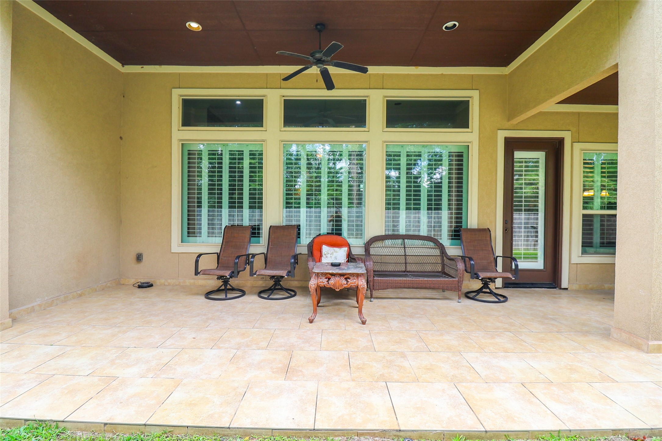 2406 Barclay Lake Lane Spring, TX 77388 - Photo 49 of 50 a building outdoor space with patio furniture and garden view