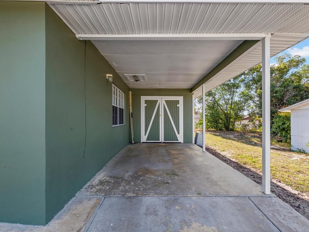 444 Edgehill Avenue Spring Hill, FL 34606 - Photo 29 of 32 a view of porch and hardwood floor