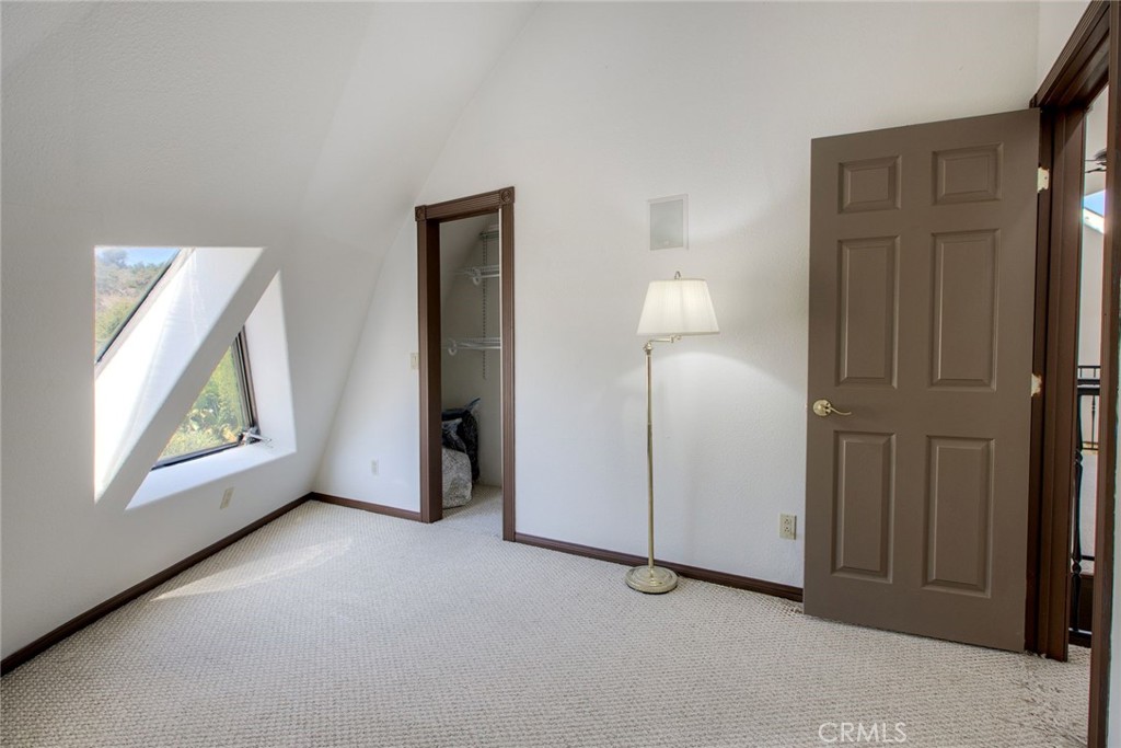4434 Brodea Lane Fallbrook, CA 92028 - Photo 25 of 38 an empty room with windows and closet