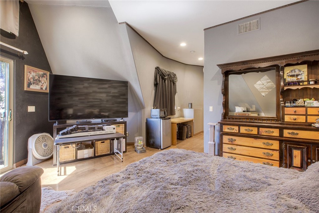 4434 Brodea Lane Fallbrook, CA 92028 - Photo 30 of 38 a living room with furniture and a flat screen tv