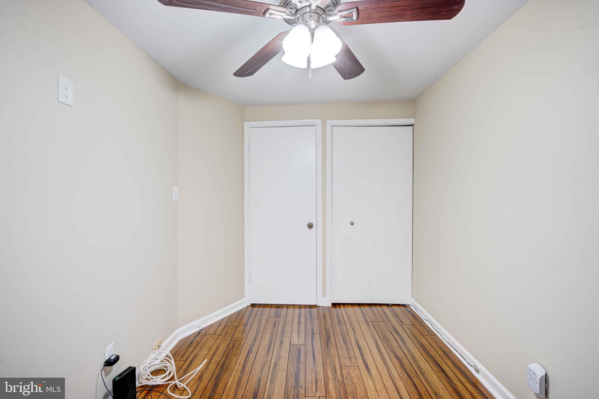 5621 Chelwynd Road Halethorpe, MD 21227 - Photo 19 of 22 a view of empty room with wooden floor